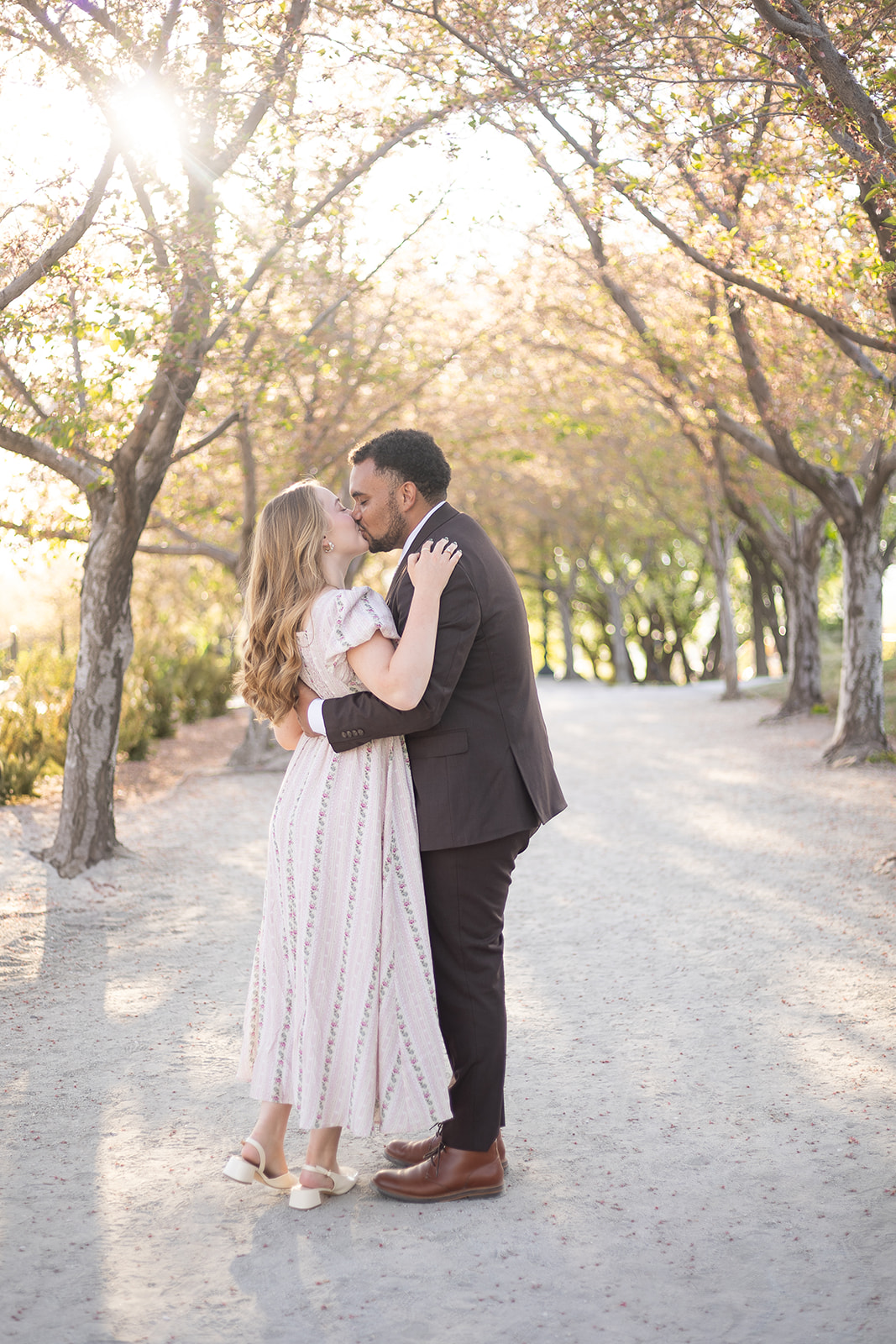Couple engagement photo portraits at the Utah State Capitol building in Salt Lake City, photographed by Park City wedding photographer Kaci Lou